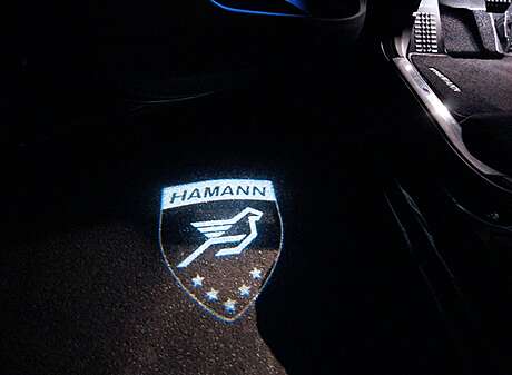 Logo proyección sobre asfalto Hamann 80099506 para BMW G30 G31 (original, Alemania)